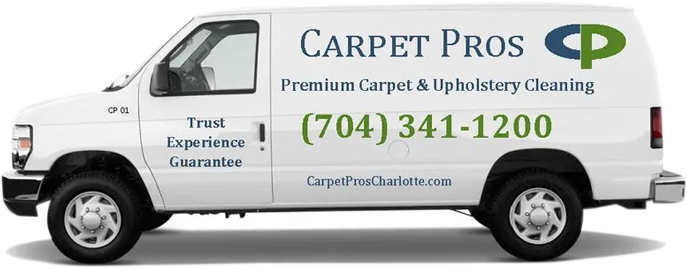 A white van with the words " carpet pros charlotte " written on it.